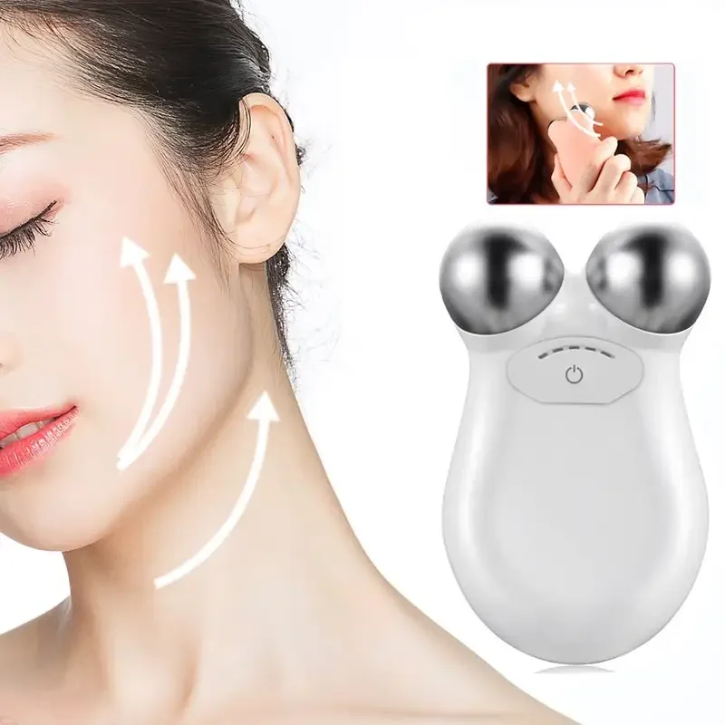 Woman using the SkinLift Pro EMS microcurrent facial massager for face lifting.